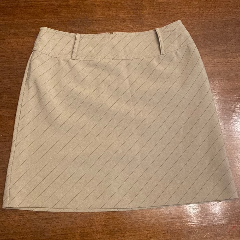 La Belle Tan with thin black stripes mini skirt. Never worn!
